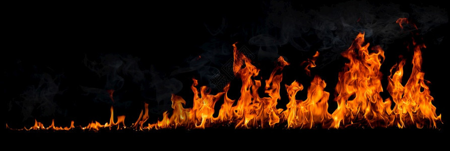 美丽的黑底烟雾火焰燃烧红色热火花上升橙发光的飞粒夜晚力量图片