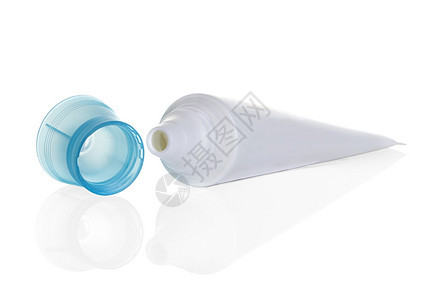 商品在白色背景上隔离的白色管状牙膏奶油液体图片