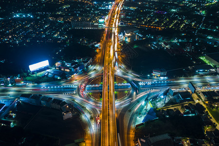 行业夜间城市风景和环路长时间泰国空中最高视线为速公路交通车辆运输的高速交通物流亚洲图片