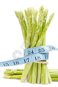 芦笋健康苗条的孤立绿色化带胶捆绑起来的Asparagus图片