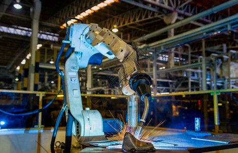 机械手臂工业的安全手臂机器人焊接测试运行背景
