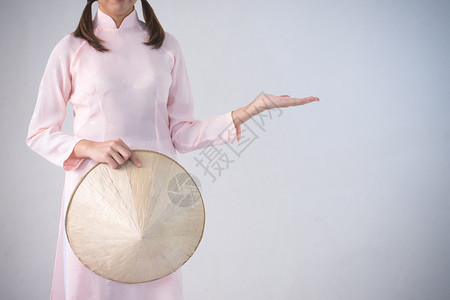 敖会安时尚穿粉红色越南服装的漂亮女人传统着装文化越南人图片