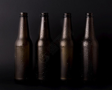 艺术黑啤酒瓶线排手图片