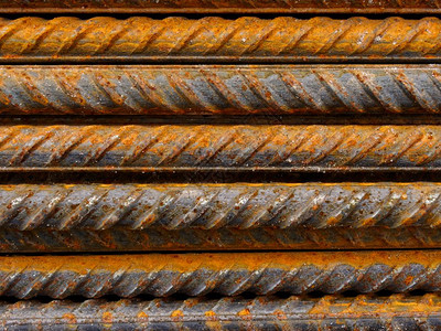 加强行业金属丝化钢棒纹质和生锈工业抽象的加固钢棒以及铁条棒图片