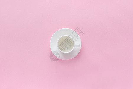 最佳马克杯复制粉红色背景的空白咖啡杯和盘子碟顶视版面空间平铺白色咖啡杯和粉红背景的盘子酱图片