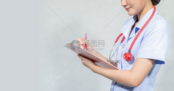 技术疾病女医生记录在人数的历史报告上女医生记录在患者人数中关心图片