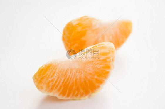 皮肤分割白色背景的充满活力曼达林水果柑橘图片