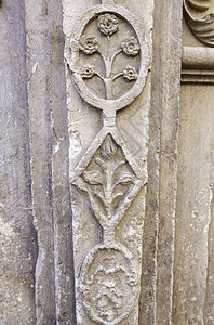 有质感的植物印度人雕刻在石头上的符号以中世纪装饰的墙详细节艺术图片
