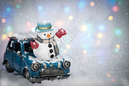 下雪背景的人和小车AF点选择和雪花蓝色的目黑图片