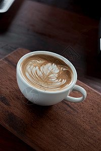 香气品尝热的有选择焦点杯热拿铁艺术咖啡重点是白泡沫热拿铁艺术咖啡图片