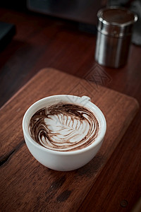 拿铁咖啡艺术文化最佳有选择焦点杯热拿铁艺术咖啡重点是白泡沫热拿铁艺术咖啡杯子背景