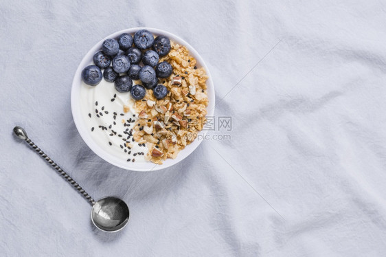 有机的饮食健康美味酸奶碗加蓝莓燕麦粥图片