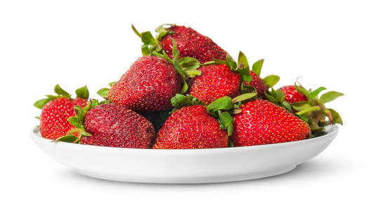桩农艺学美丽的白板上一堆新鲜多汁的草莓在白色本底被隔离的白色盘子上图片