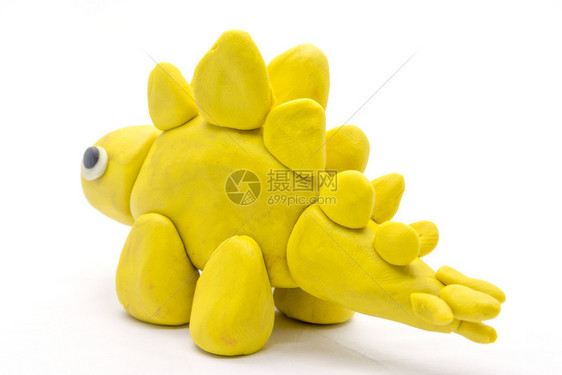 白色背景上的玩偶字元Stegosaurus黄色的有创造力灭绝图片