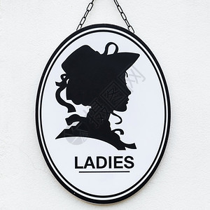 墙上女绅士或男子符号的旧式或经典风格妇女士和绅标志迹象厕所淑女图片