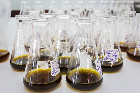 实验室装有化学品的医疗玻璃器件有毒的瓶子酸图片