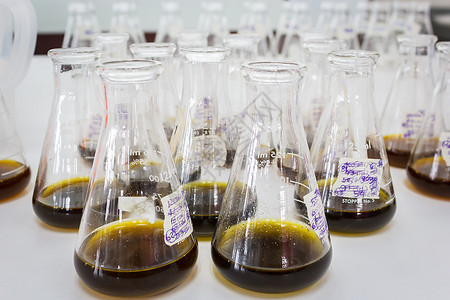 实验室装有化学品的医疗玻璃器件有毒的瓶子酸图片素材