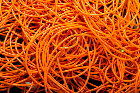 行业橙色抽象电缆背景有趣的浅光拷贝粘贴纹理和自然多彩的交融发光美丽图片