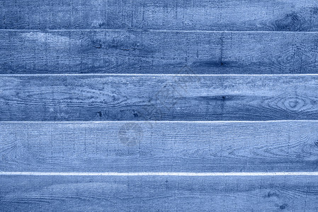 有质感的本背景或模拟的木质纹理蓝关闭巴恩银行墙纹理或用经典蓝色20年的颜色刻在古典蓝色上的铁栅栏空细节图片