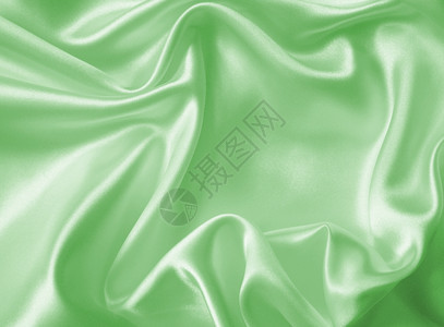 或者海浪平滑优雅的绿色丝绸或纹质可用作背景浪漫的图片