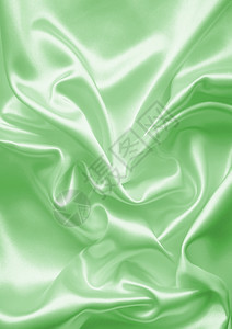 感平滑优雅绿色丝绸或纹质可用作背景时髦的材料图片