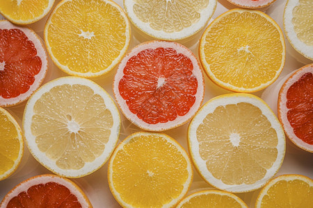 多汁的紫色橙顶部视图排列柑橘图片
