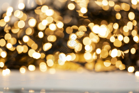 丰富多彩的闪耀散焦金光抽象圣诞节或假日背景纹理闪发光的黄色模糊暖调彩散焦金光抽象圣诞节或假日背景纹理闪发光的黄色模糊暖调充满活力背景图片
