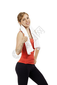 瑜伽健身女用白毛巾色背景的大拇指露出快乐的年轻健身女拇指年轻运动型图片
