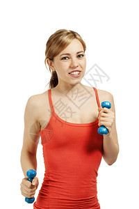 钟女孩体能锻炼年轻健身女子在白色背景上用蓝的哑铃锻炼图片
