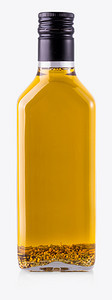 金子黄色的素食主义者白色背景的沙拉油加芥子酱图片
