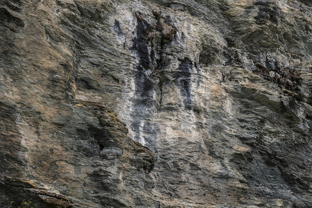 坚硬的墙附生植物矿和石块质料或背景岩山和石的形态图片