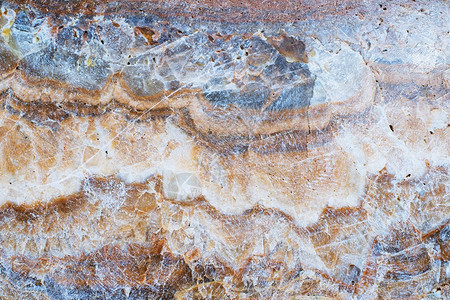 泰国棕褐石表面纹理背景贴近了风化地质学图片