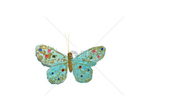 与粉红色和蓝珠子分离的手工制造绿蝴蝶与粉色和蓝珠子隔离在白飞自然艺术图片