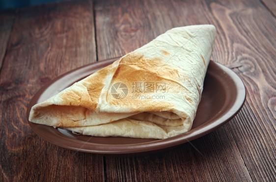 Markook在LevantYufka常见的扁面包是土耳其它是一种薄圆和无叶的平面包与熔岩类似小吃沙威玛大饼图片