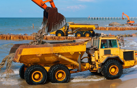 岸上施工设备防波堤施工海岸保护措施防波堤工车辆土壤具体的图片