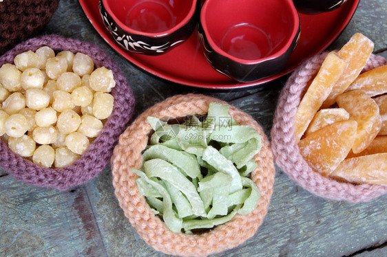 越南语为了太阴果酱是新年月球上的传统食物可以用甜土豆莲花种子姜汁加糖越南习俗背景多彩等制作注TetFoodforTet假日在春天图片