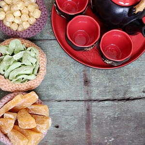 盘子生姜果酱是新年月球上的传统食物可以用甜土豆莲花种子姜汁加糖越南习俗背景多彩等制作注TetFoodforTet假日在春天的越南图片