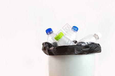 空的回收垃圾箱中空塑料水瓶等待回收利用以拯救地球的概念保护GiblesavetheEarth采取全球的图片