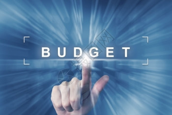 在带有缩放效果背景的预算按钮上点击鼠手赤字薪水项目金融的高清图片素材