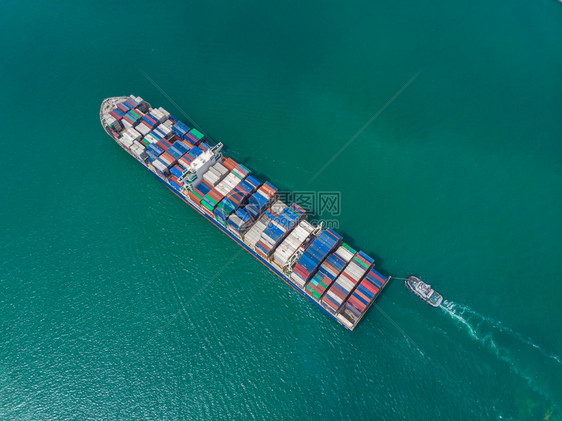 新加坡终端红色的国际集装箱运输进口出大型corgo船从无人驾驶飞机的海洋货运空中最高航程角度图片