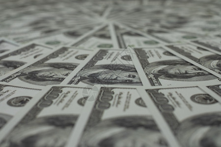 纸桩口袋许多钞票都是在一个美丽的选择焦点下安排注美观的有选择焦点图片