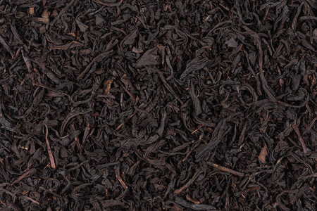 文化节食草药干黑色茶叶接近背景纹理图片