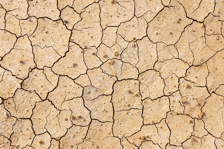 热的干旱棕色土或破碎的地质背景图片