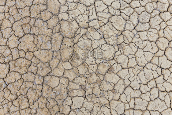 抽象的土壤棕色干或破碎的地质背景沙漠图片