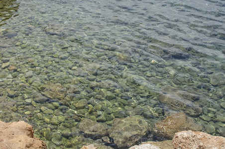 西班牙马洛卡omMallorca用于背景质地的浅光透明绿色海洋水岩浅光透明绿色海洋水岩自然户外巴利阿里图片