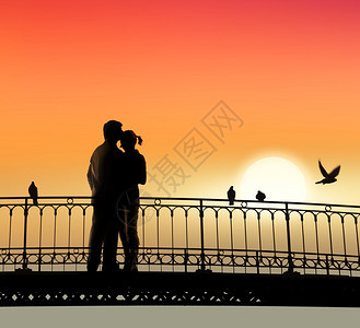 秋天日落背景下桥和一对恋人的剪影情节旅游图片