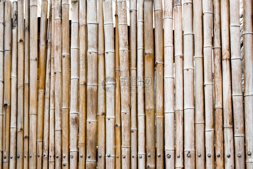 复古的A旧竹栅栏线的背景和格局丰富多彩的束图片