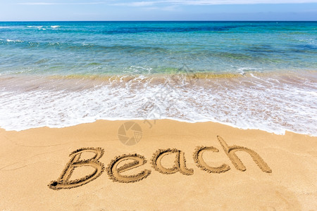 写在沙滩上的英文海滩图片素材