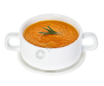 橙盘子白背景孤立的南瓜汤用餐图片