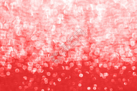 织物红色的背景有浅红色梯度亮片素纹理背景用于节假日和的闪光亮彩色灯光Fabric亮色明的闪光画图背景为节假日和派对横幅提供淡红梯图片